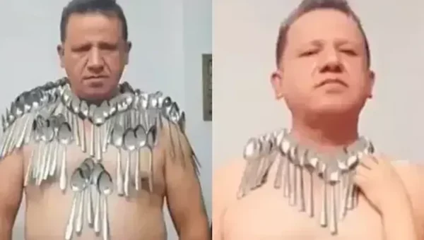 An Iranian man sets a new Guinness World Record by balancing 85 spoons on his torso