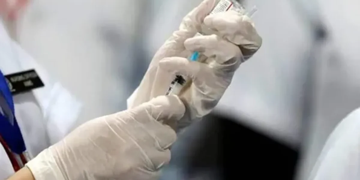 As Covid-19 cases multiply, frontline workers and seniors receive ‘precautionary doses’