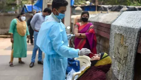 India records 33,750 new COVID cases, Omicron infections reach 1,700