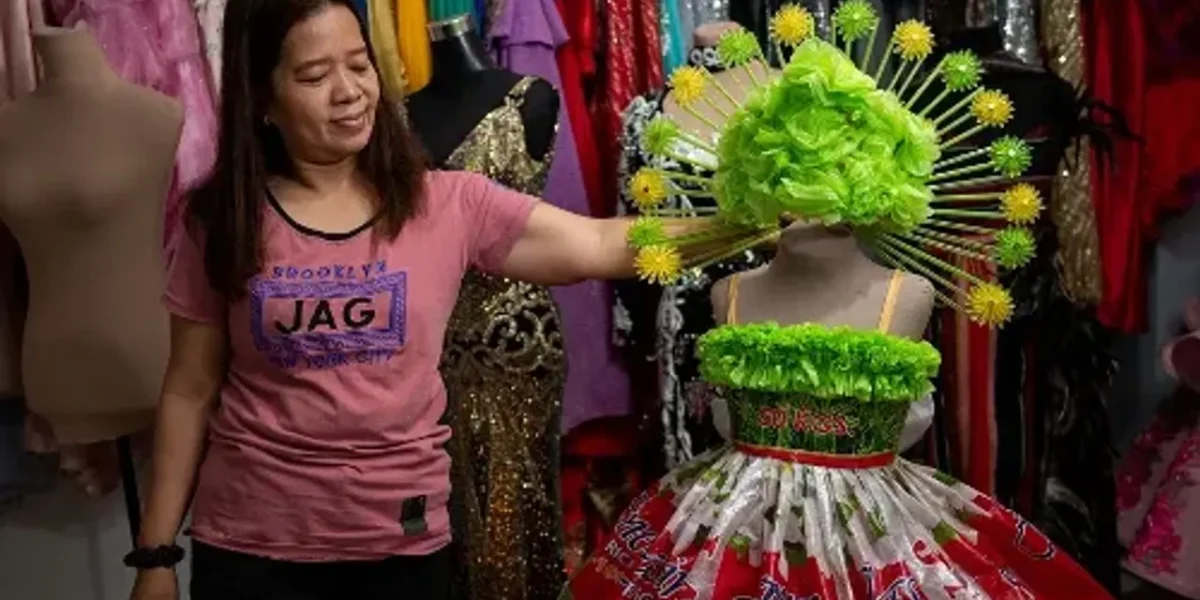 Philippine designer fashions gowns out of recycled trash