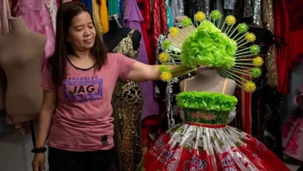 Philippine designer fashions gowns out of recycled trash