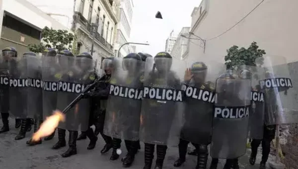 Peru police use tear gas to block protesters from marching