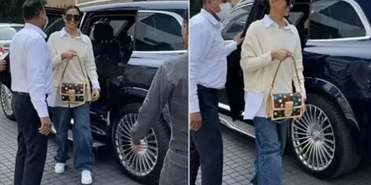 Deepika Padukone in white shirt, sweater and baggy jeans gives an effortless chic look