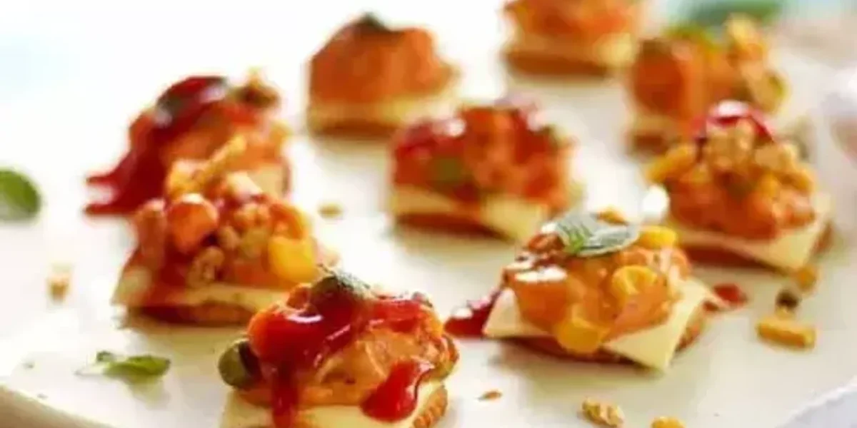 Cheesy Monacos Recipe: Try this simple recipe by adding a punch of cheese, spice and herbs layered