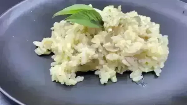 Mushroom Risotto with Cracked Wheat Recipe: Be it a party, pot luck or simple get-together at home, this risotto can be made for any occasion