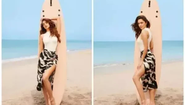 Kiara Advani rocks the beach look with a surfboard