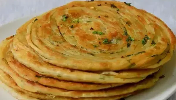 Chilli Garlic Paratha Recipe: If you like to try out new and unique recipes at home, then make sure you bookmark this recipe right away