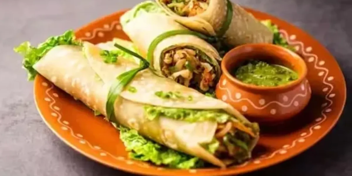 Chole Roll Recipe: A delicious snack loaded with the goodness of chickpeas, onion, tomato, capsicum and spices.