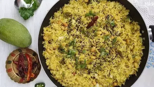 Mavinakayi Chitranna Recipe: Mavinakayi Chitranna, also known as Mango Rice is a lip-smacking dish prepared with rice