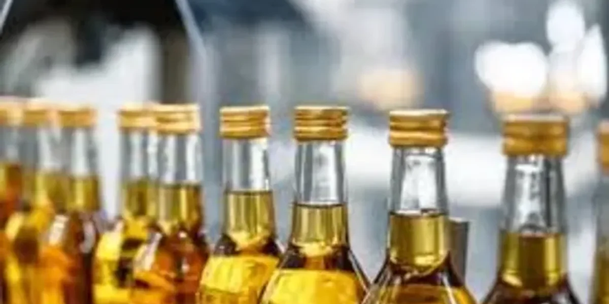 Ahmedabad: 114 litres of country liquor ferried on scooter!