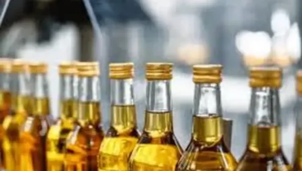 Ahmedabad: 114 litres of country liquor ferried on scooter!