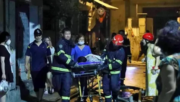 A fire that burned in a 9-story apartment building in Vietnam’s capital has killed about 12 people
