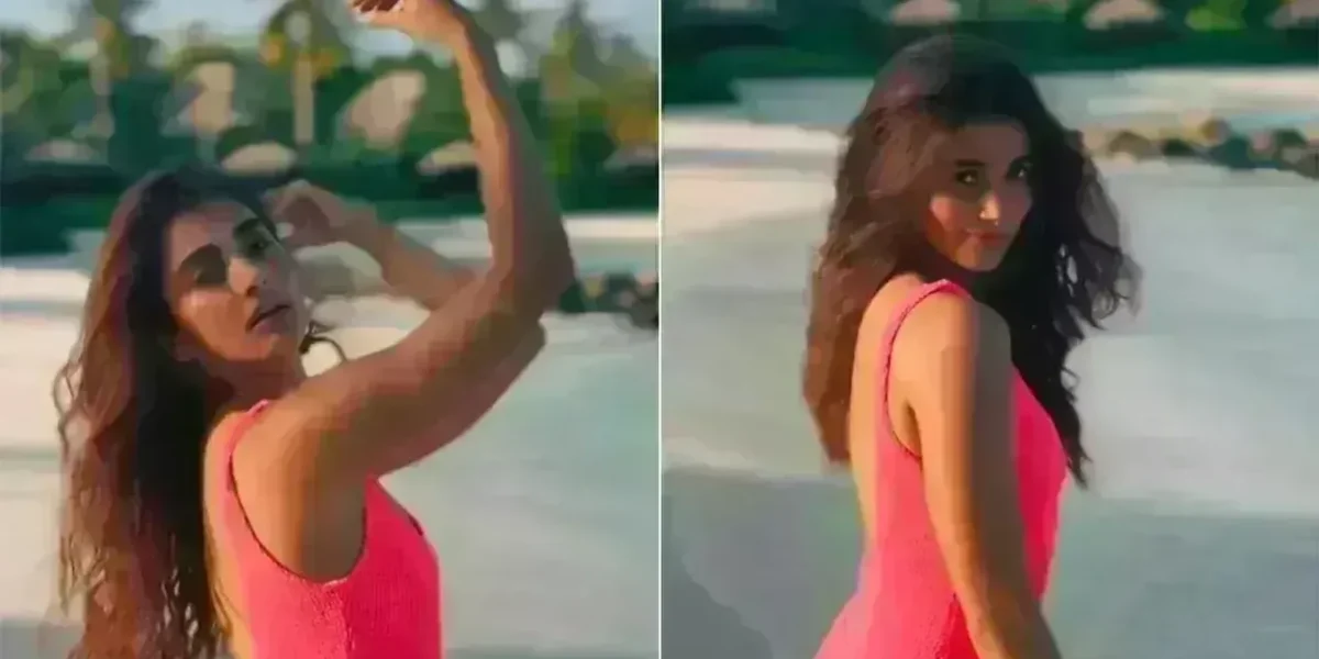 In a neon pink swimsuit, Pooja Hegde is taking Barbiecore Fashion to the beaches of Maldives