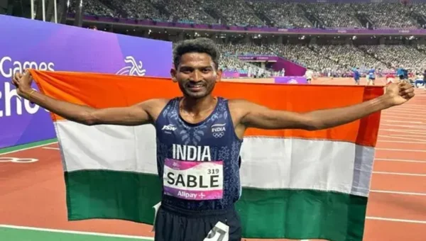Union Minister Anurag Singh Thakur congratulates Ram Baboo and Manju Rani on winning bronze medal in 35 km Race Walk Mixed Team event at Asian Games