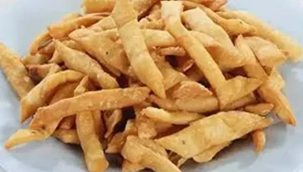 Palak Namak Pare Recipe: Woo, your loved ones with your exceptional culinary skills and we bet they will shower you with praise