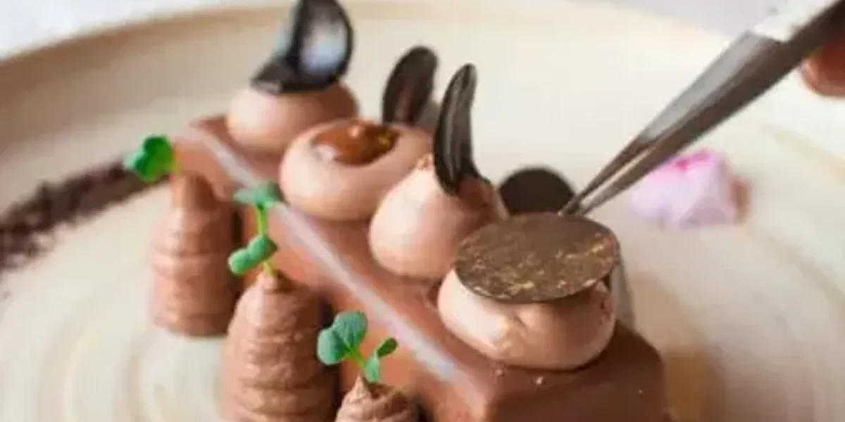 Heaven Bar Recipe: Try this delish Heaven bar recipe made with the goodness of crispy base and topped with creamy chocolate