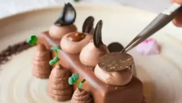 Heaven Bar Recipe: Try this delish Heaven bar recipe made with the goodness of crispy base and topped with creamy chocolate