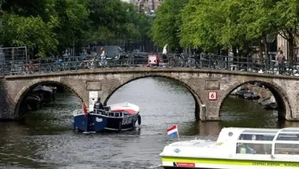 Amsterdam bans construction of new hotels and slashes river cruise stays amid over tourism effects