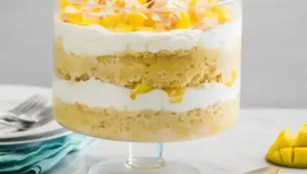 Mango Trifle Recipe: Featuring fresh mangoes and strawberries, this Continental dessert recipe would be surely loved by everyone