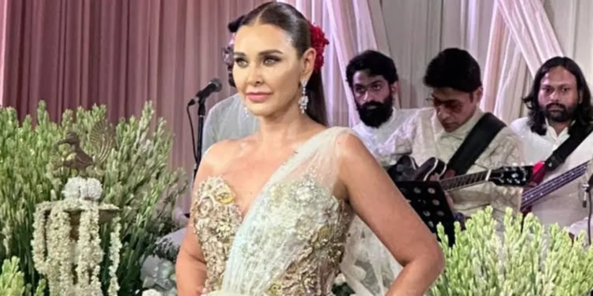 Lisa Ray creates magic in Stunning Rahul Mishra’s saree gown at ICW 2024