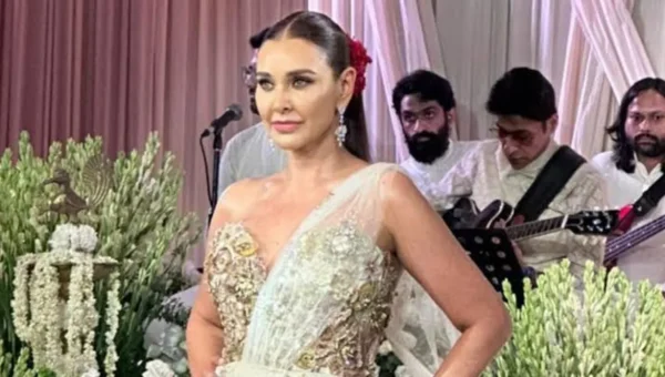 Lisa Ray creates magic in Stunning Rahul Mishra’s saree gown at ICW 2024