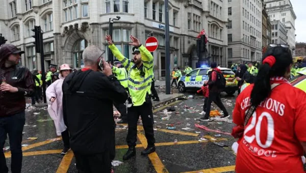 50 injured as car crashes into victory parade of Liverpool football fans